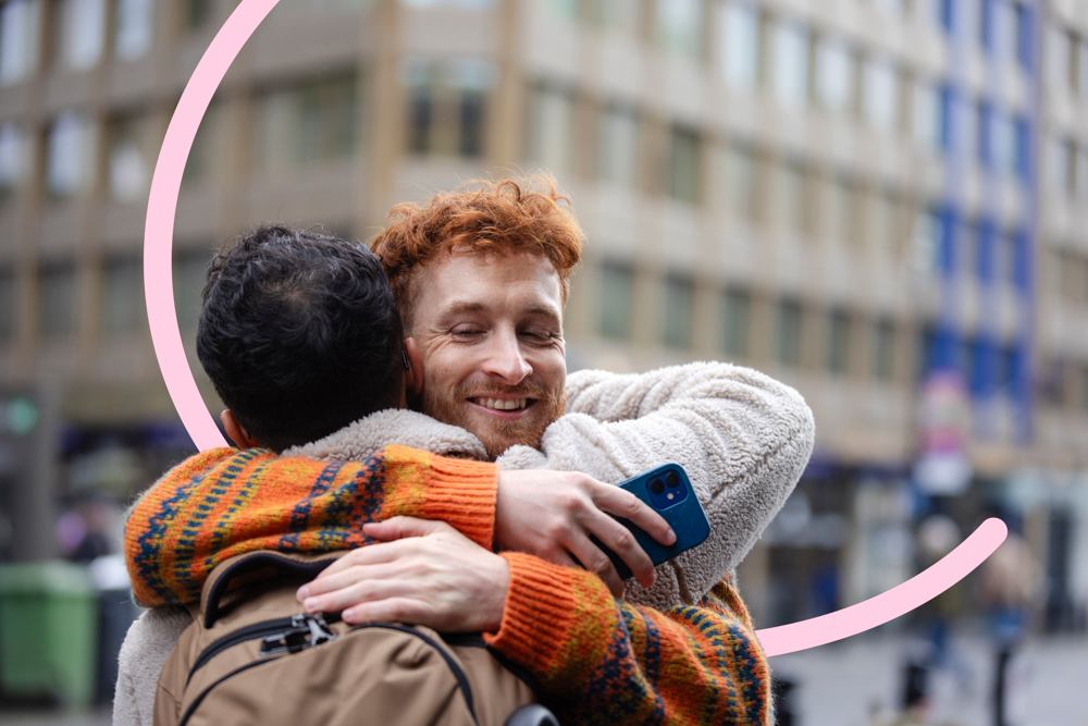 Two adults hugging